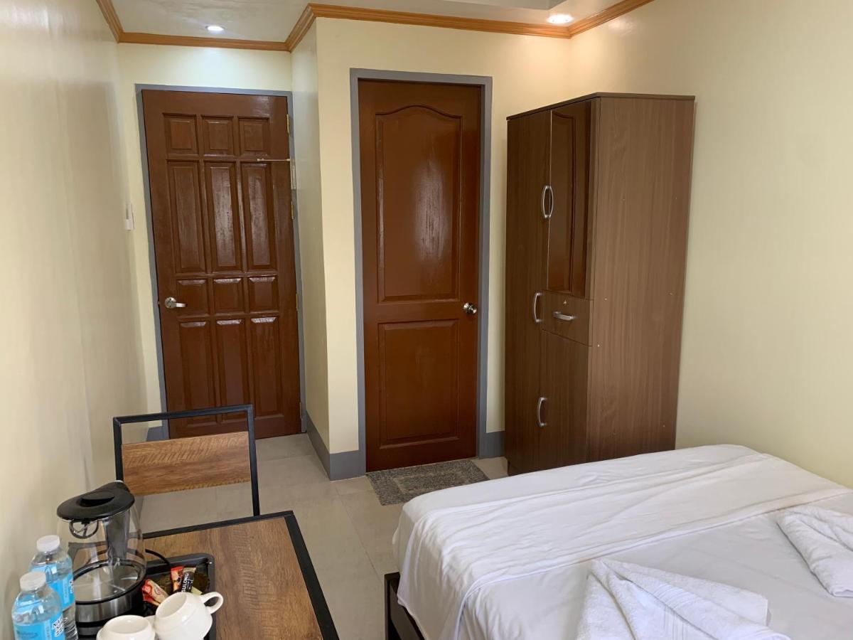 Zl Travelers Inn Batuan エクステリア 写真