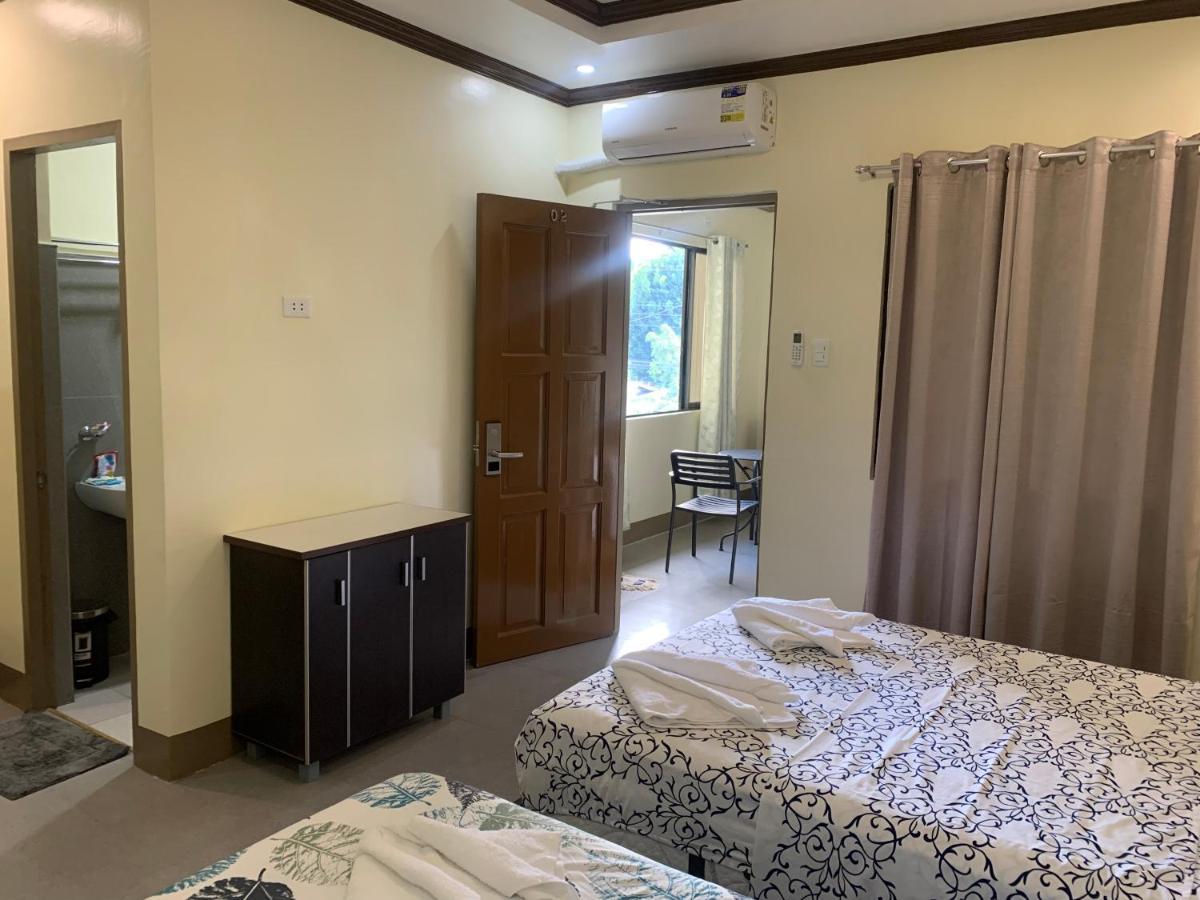 Zl Travelers Inn Batuan エクステリア 写真