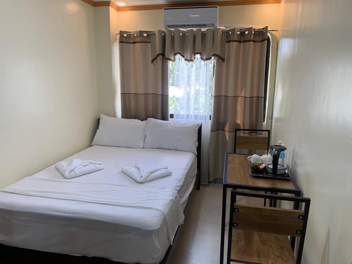 Zl Travelers Inn Batuan エクステリア 写真