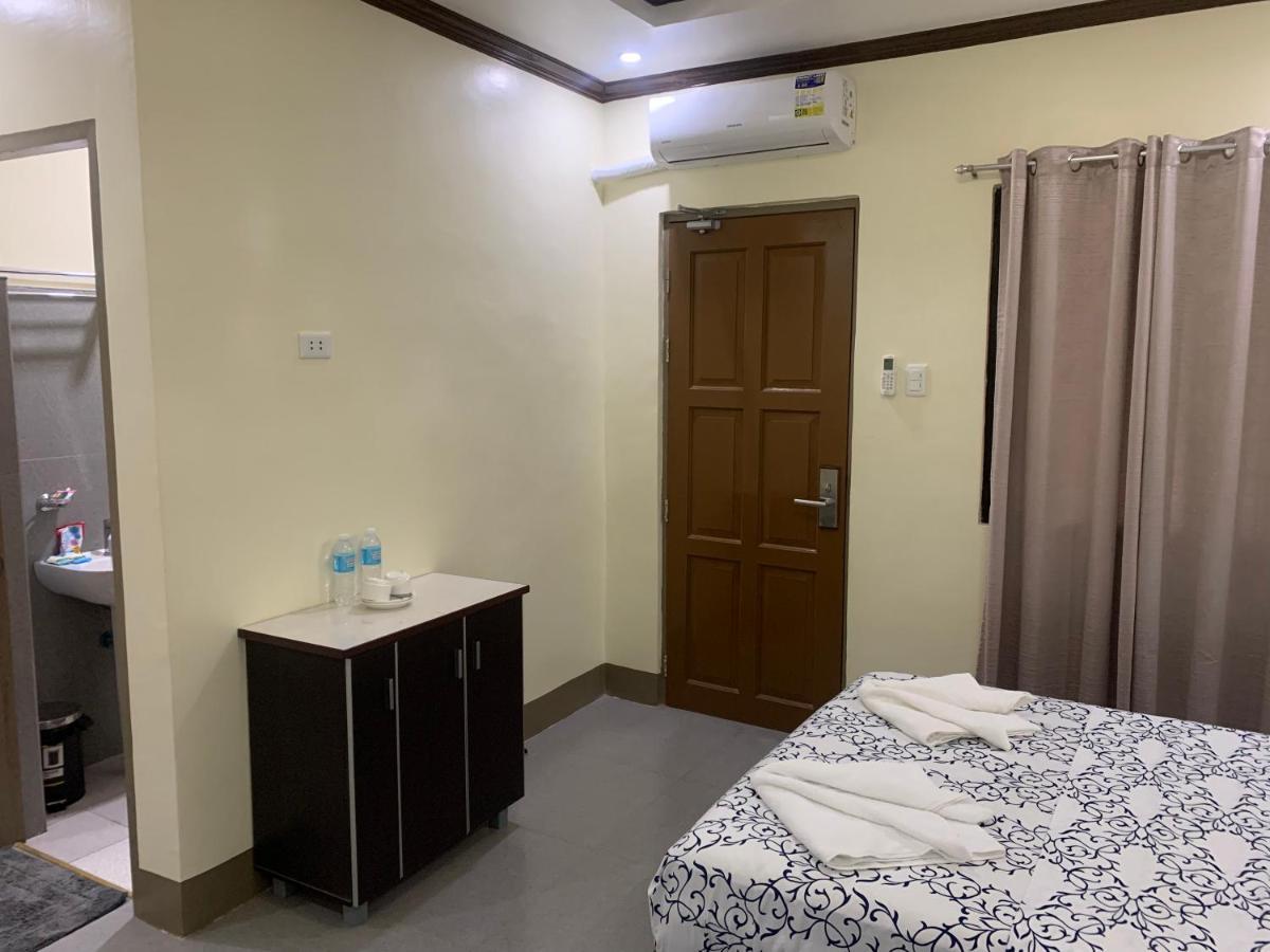 Zl Travelers Inn Batuan エクステリア 写真