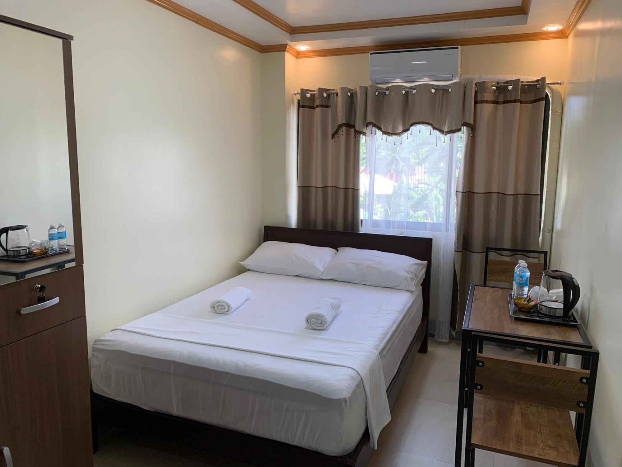 Zl Travelers Inn Batuan エクステリア 写真