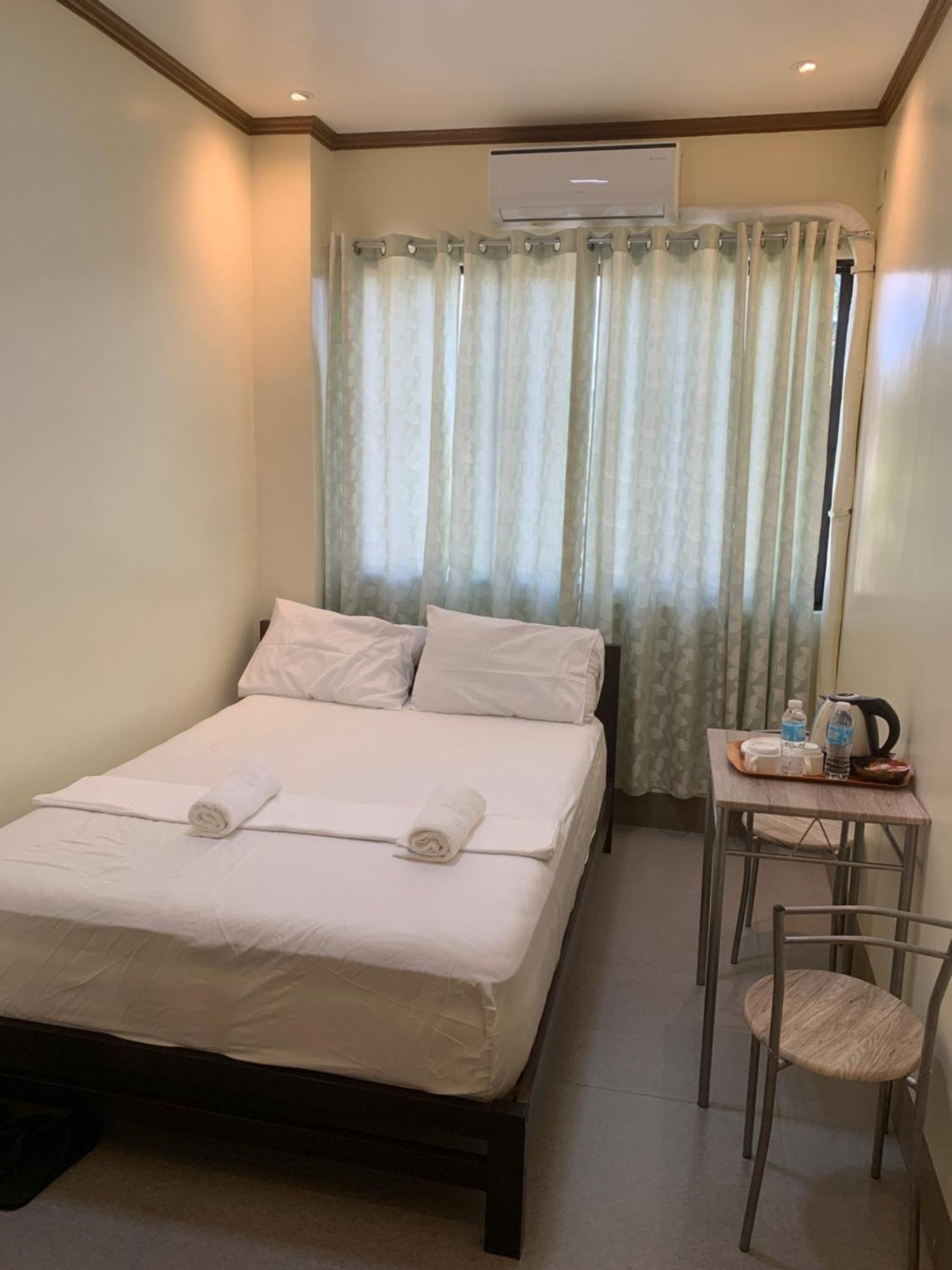 Zl Travelers Inn Batuan エクステリア 写真