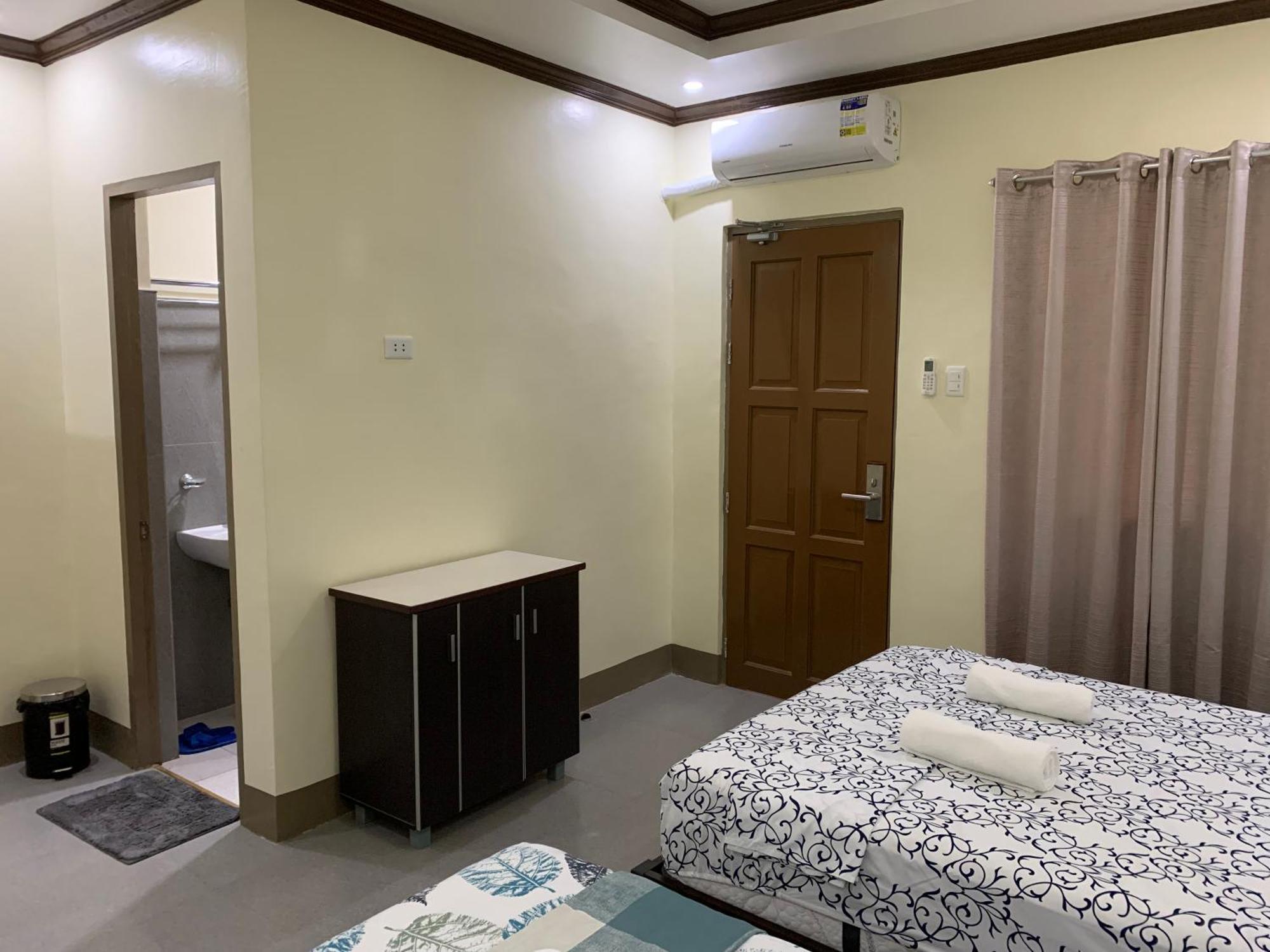 Zl Travelers Inn Batuan エクステリア 写真