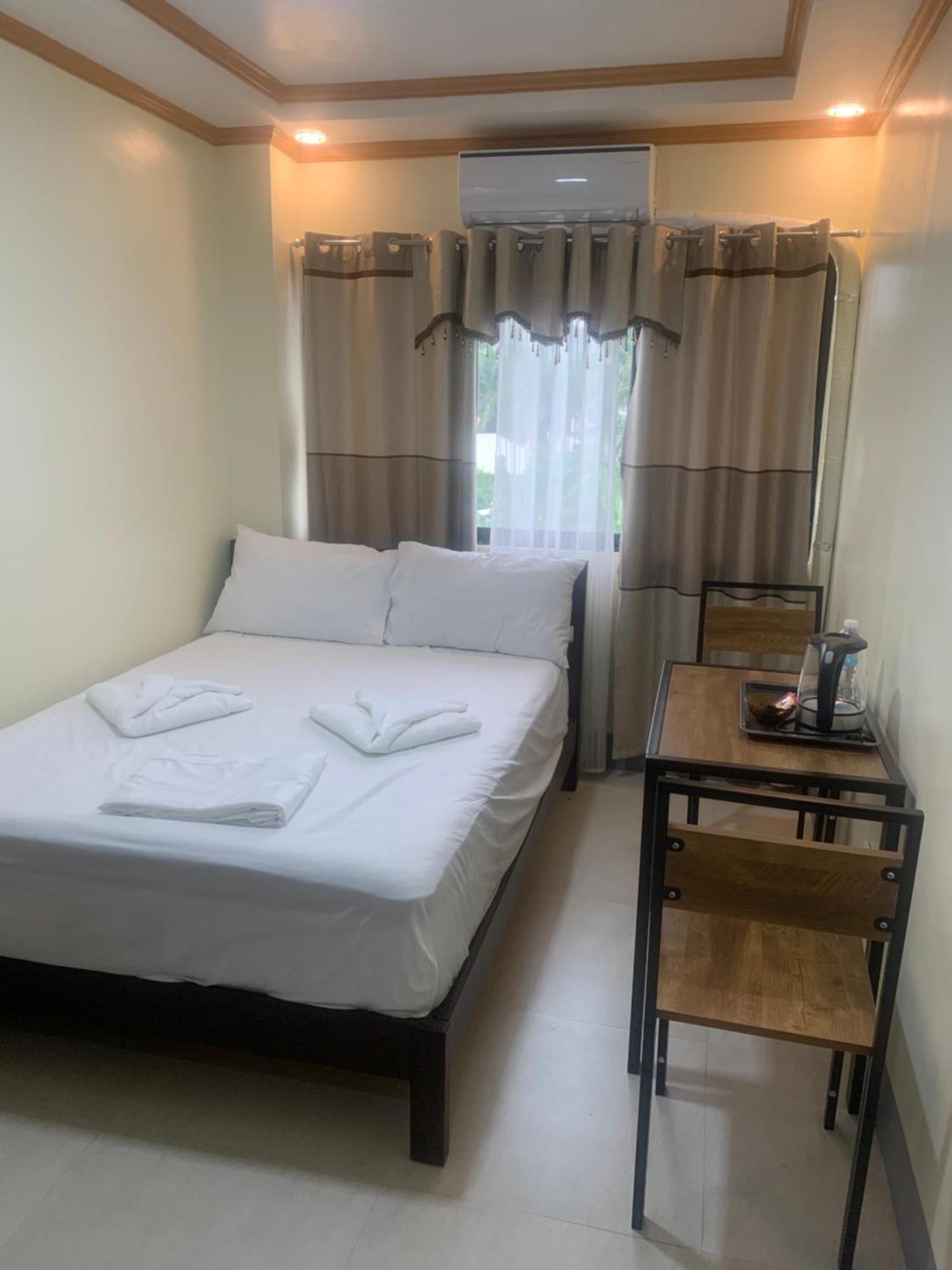 Zl Travelers Inn Batuan エクステリア 写真
